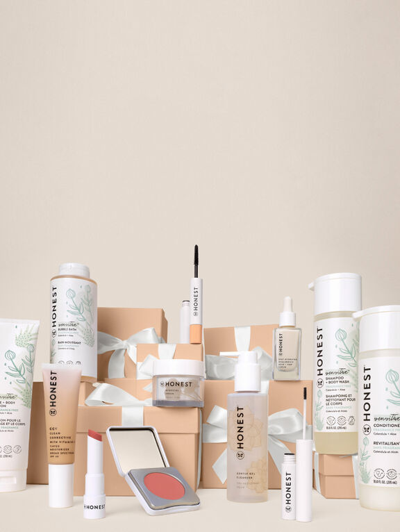 Woman wiping toddler's nose with Honest Sniffer Soother Wipes