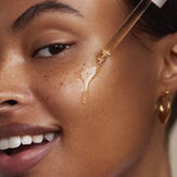 Woman using honest serum