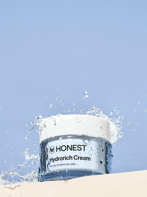 Honest Hydrorich Cream against blue background