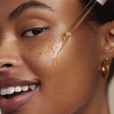 Woman using Honest Organic Beauty Facial Oil