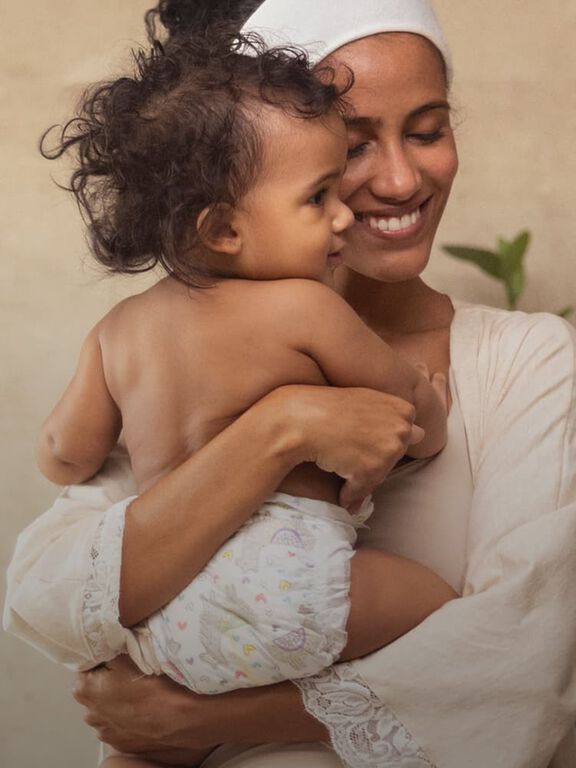 Woman holding toddler