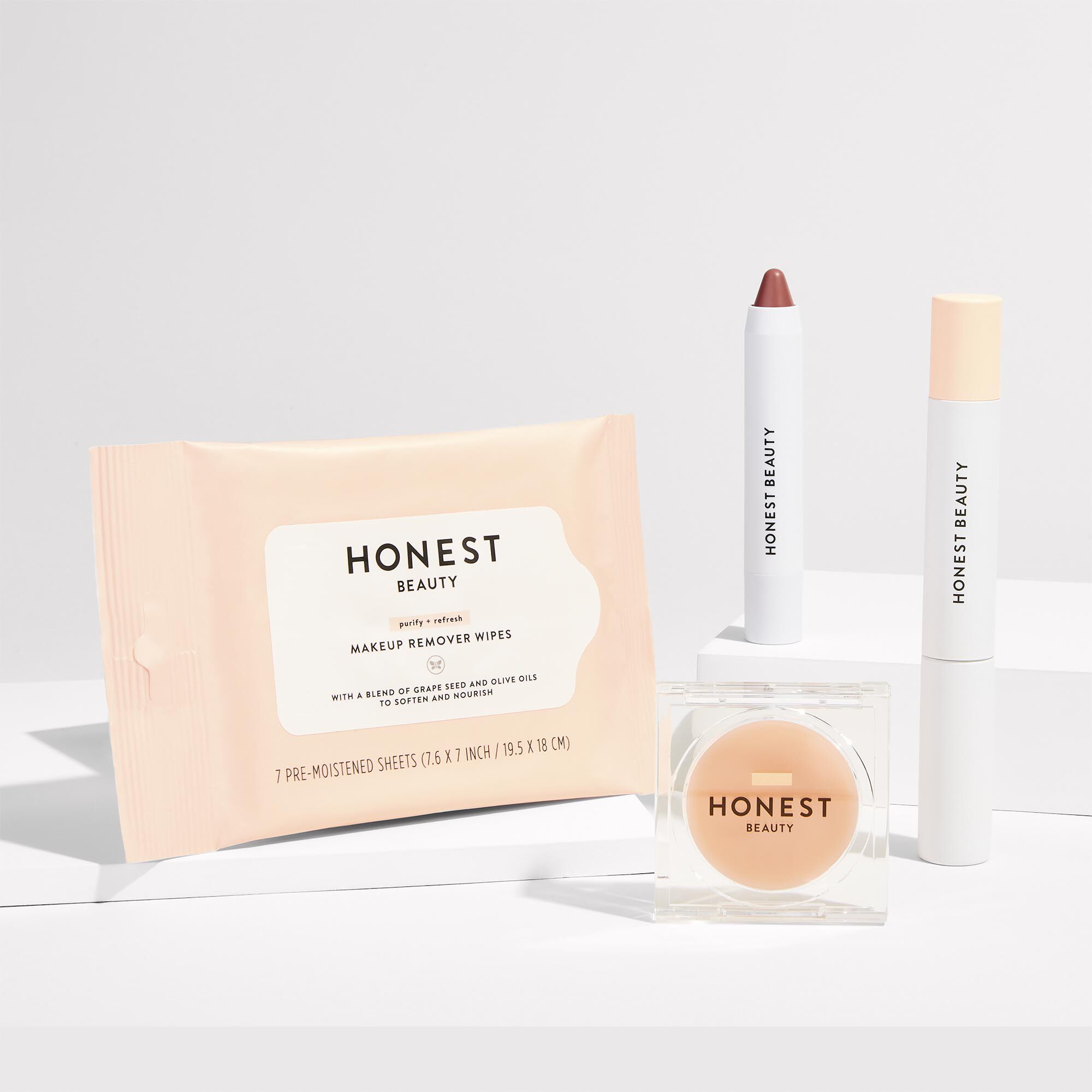 group shot of the 7 count makeup wipes, lip crayon, magic beauty balm ad the extreme length mascara