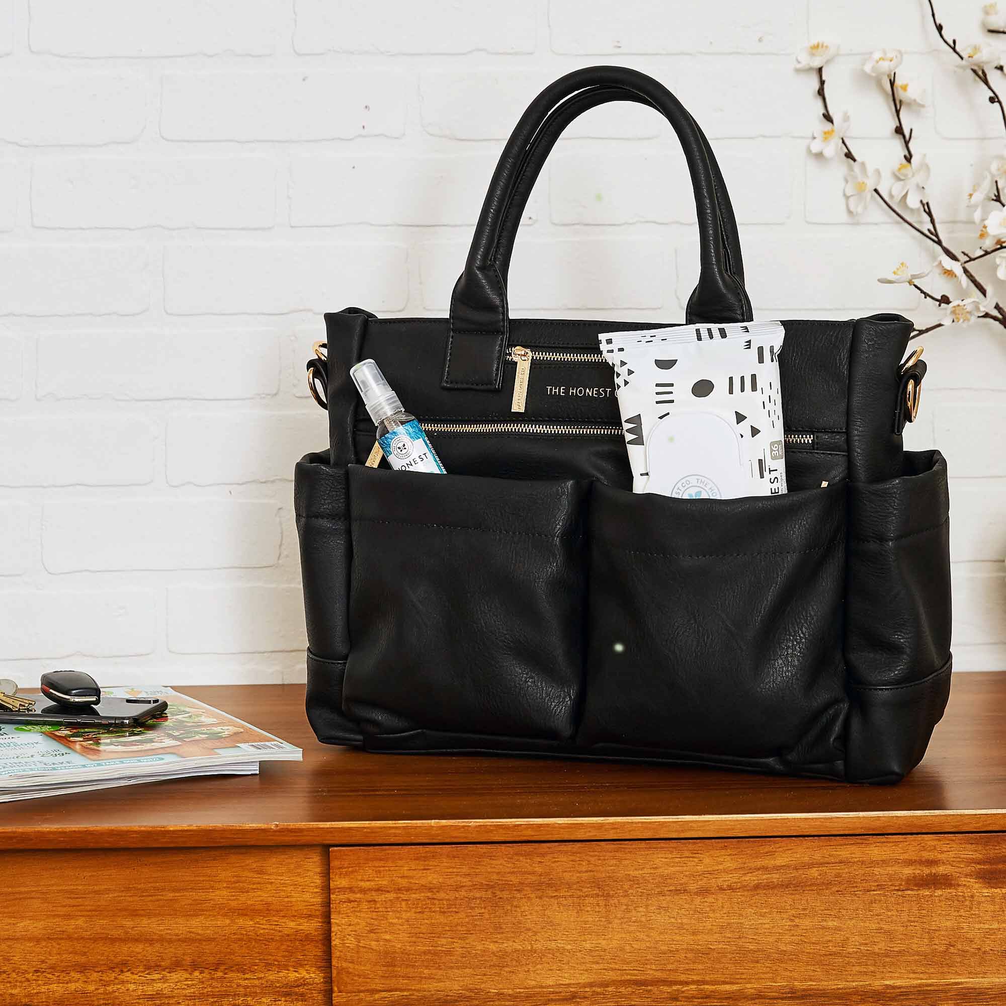 Everything tote with wipes and hand sanitizer in a home setting