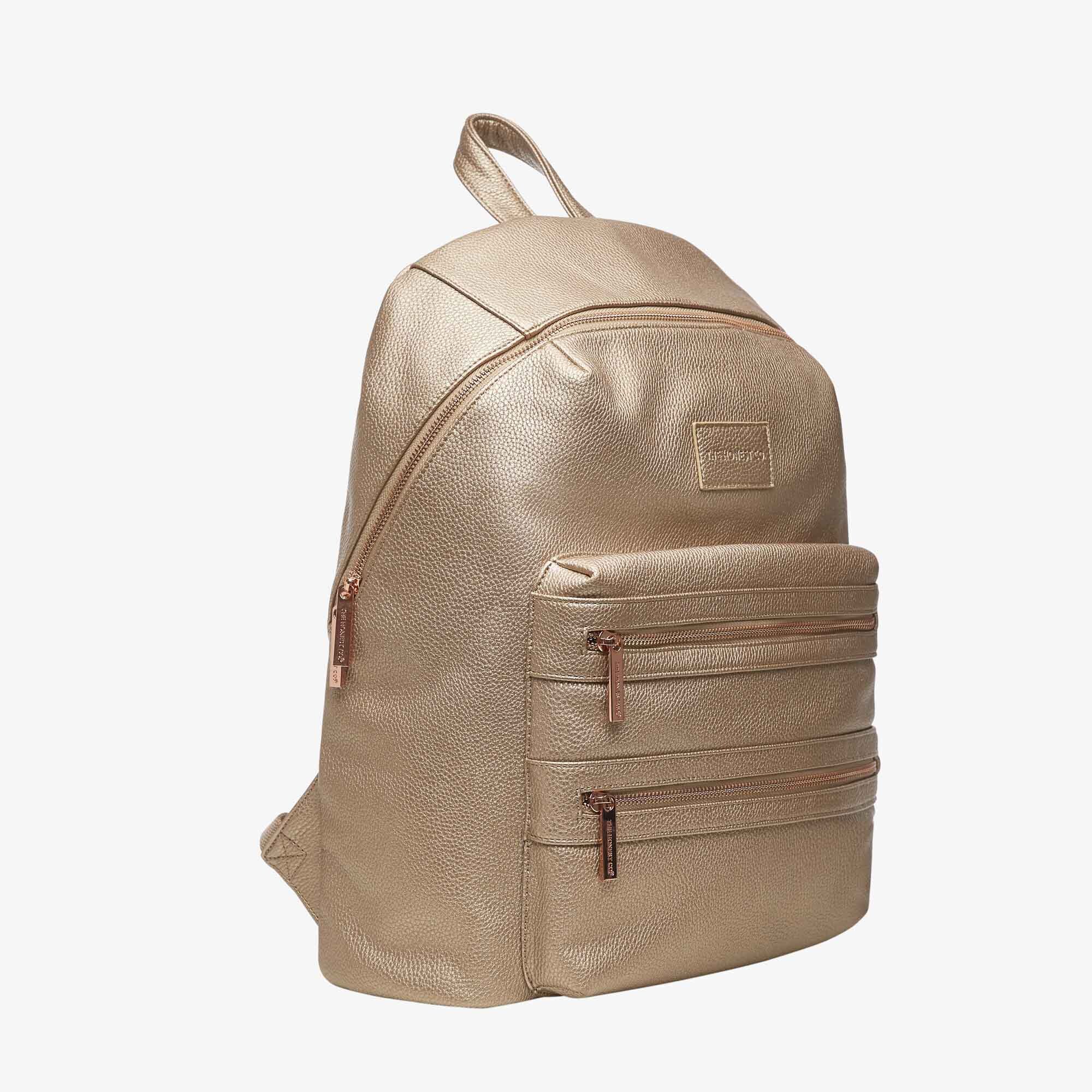 honest city backpack diaper bag in cognac