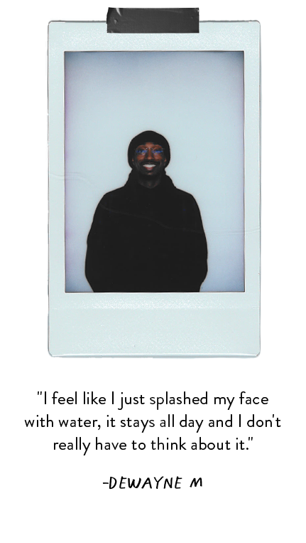 Polaroid photo of man wearing black beanie and hoodie.