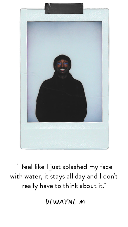Polaroid photo of man wearing black beanie and hoodie.