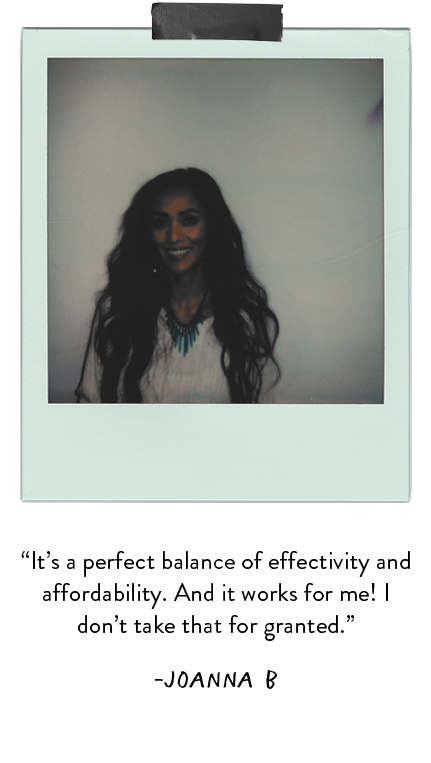Polaroid photo of woman wearing white shirt and turquoise necklace