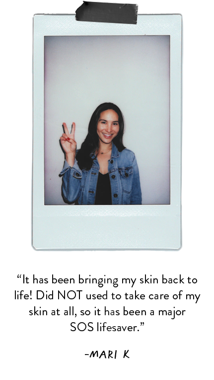 Polaroid photo of woman posing with peace sign wearing a denim jacket with black shirt.