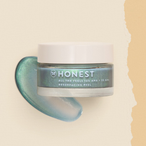 Jar of Honest All the Feels Resurfacing Peel against a canvas background and product smear