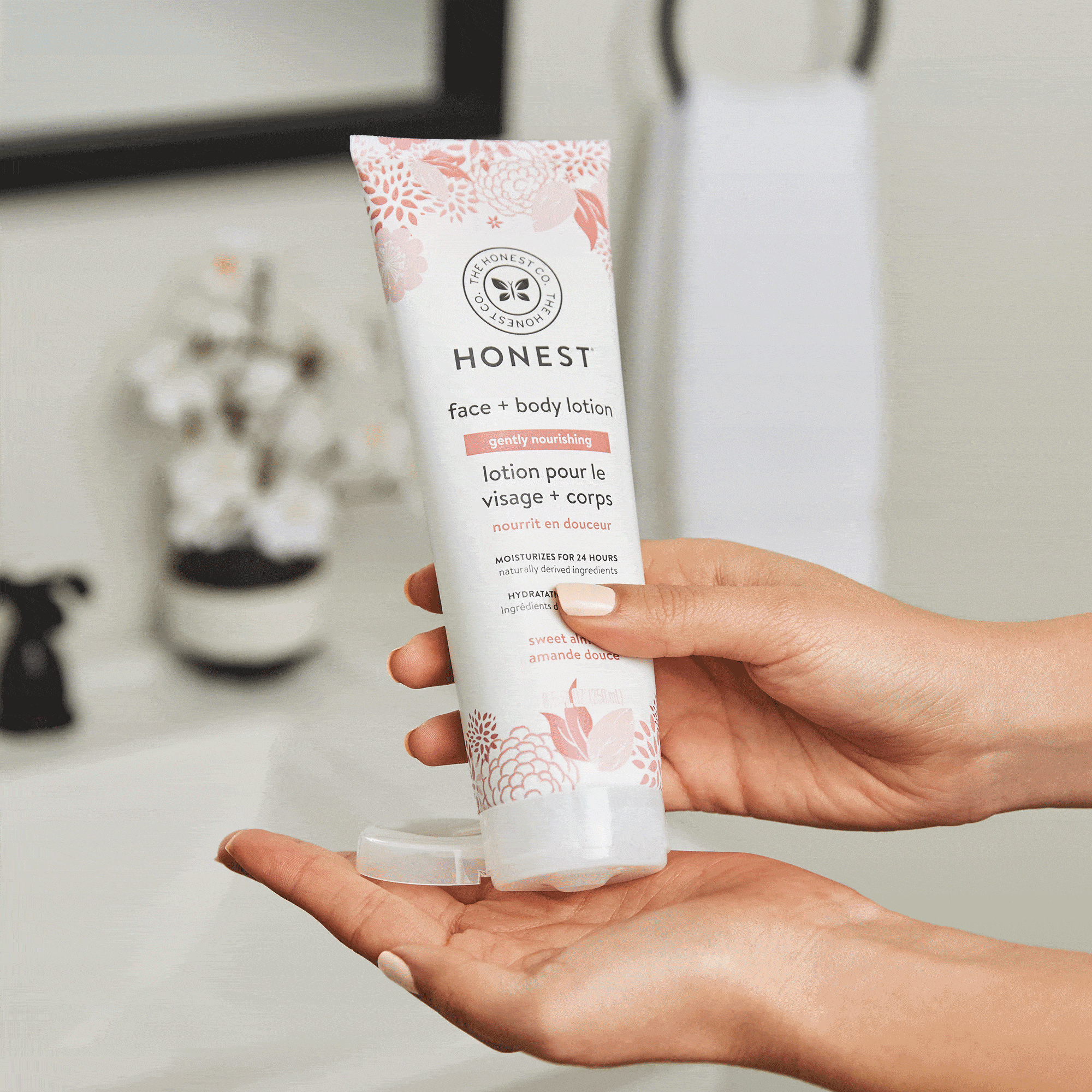 gently nourishing face and body lotion, pouring into hand